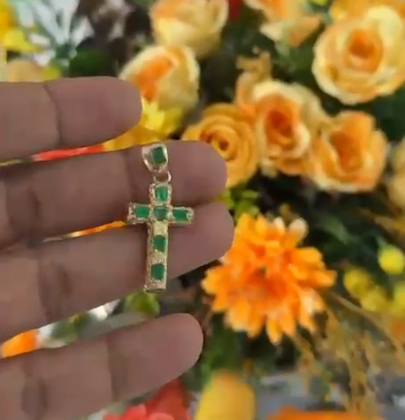 Assortment of emeralds on parchment